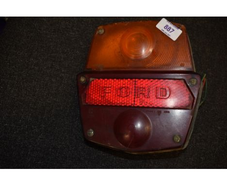 A vintage Ford motor car or truck rear light or lamp