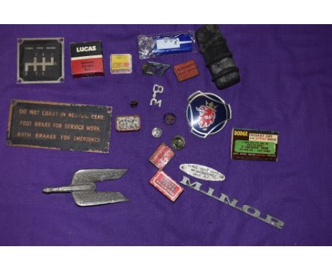 A selection of motor car engine badges and similar garage signs