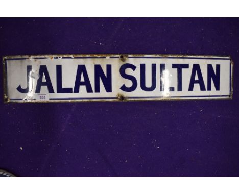 A vintage road side enamel sign reading Jalan Sultan
