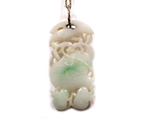 Mottled green and white pendant Chinese carved and pierced, with a bird and fruit, with a gilt chain 7cm long  Sold with a co