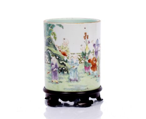 Cylindrical porcelain brush pot Chinese, 19th Century painted in enamels with children playing in garden against the bamboo f