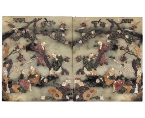 Pair of mottled jade panels Chinese, circa 1900 mounted with various hardstone and ivory mounts with scholars beneath a pine 