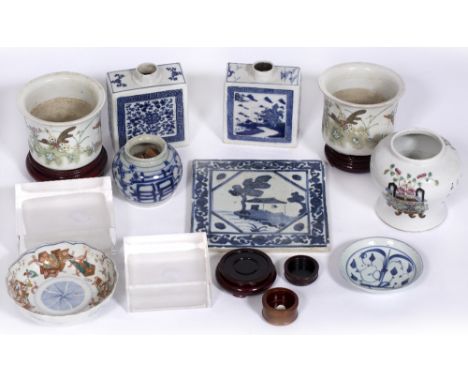 Group of Chinese and Japanese porcelain pieces to include a tile, jardiniere and other items