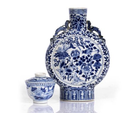 Blue and white moon flask Chinese, 19th century painted depicting flowers and birds, with two animals adorning the neck, toge