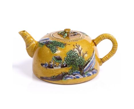 Jingdechen yellow glazed teapot and cover Chinese, Daoguang (1821-1950) the domed body carved and moulded in relief and highl