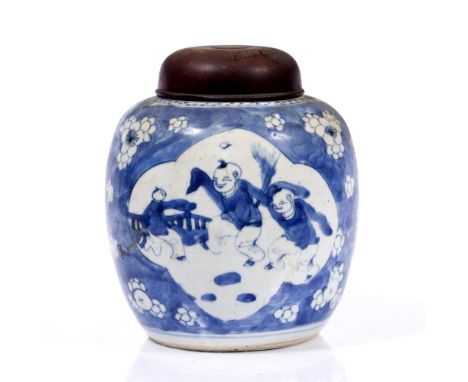 Blue and white ginger jar and cover Chinese, 18th/19th Century having a panel of boys playing with prunus surround, with a wo