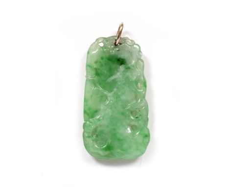 Jade pendant Chinese,19th/early 20th Century simply carved with a bird and trailing foliage, with suspension loop 4cm long