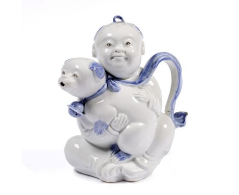 Hirado blue and white porcelain teapot Japanese, 19th Century in the form of a boy holding a puppy 20cm