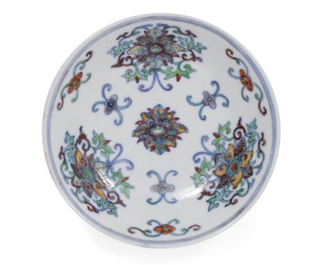 Doucai enamelled shallow saucer dish Chinese, 19th Century decorated centrally with a stylised "Indian" lotus with three simi