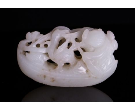 Qing dynasty, white jade toggle carved boy  with a goose on a boat; 2 1/8 by 1 1/8 by 5/8  in.