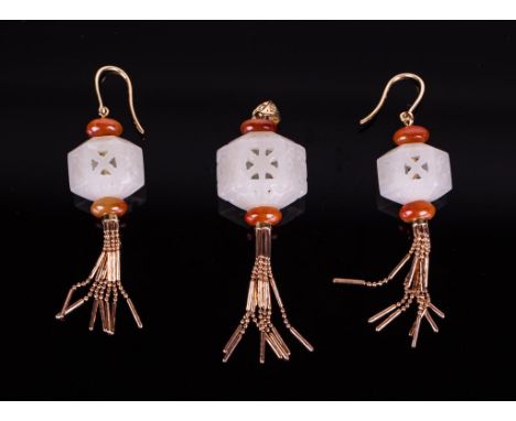 Qing dynasty, each consists of a hexagonal  white jade beads carved in open work; pendant  (3/4 in. w), earrings (1/2 in. w)