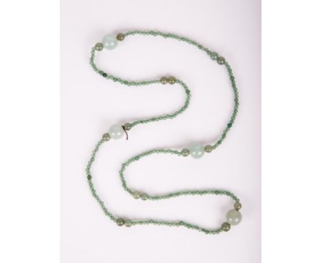 20th century, jadeite beads varies in colors  from light green to dark green; 32 1/4 in. l