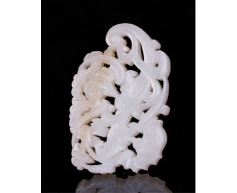Qing dynasty, white jade plaque with a slight  yellowish tone on some area; 2 5/8 by 1 3/4  by 2/8 in.