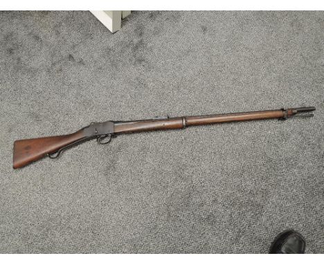 A Martini Henry Long Lever Rifle, made by Enfield, Top loader, Ram Rod present, Crown VR Enfield 1888 marks, numbered G2452, 