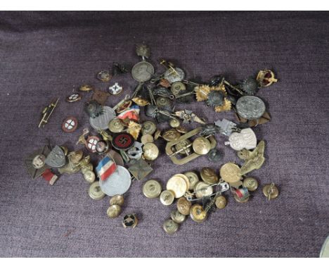 A collection of Military Buttons, Officer's Pips and Crowns, RAF Buttons, ARP Badges, RAF Padre Brooches x2, National War Sav