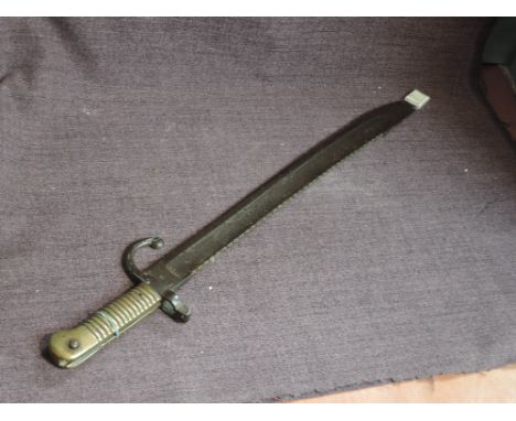 A Belgium Engineers Bayonet 1868 model, blade marked 1877 numbered V2740 on guard, other marks seen blade length 49cm, overal