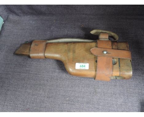 A Wooden holster stock for a Mauser, possible model 1912, complete with leather webbing length 36cm
CONDITION REPORT
Appears 
