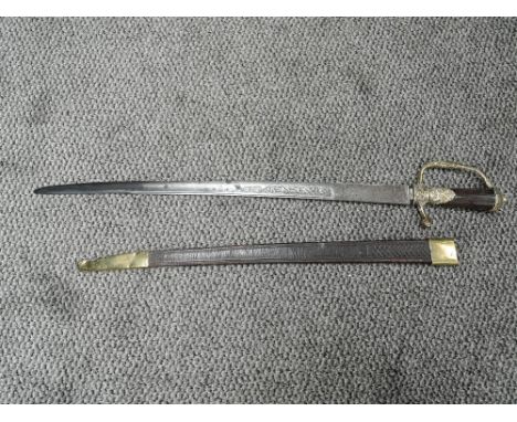 A possible 19th century European Hunting Sword, no makers marks seen having brass decorated knuckle guard and pommel with hun