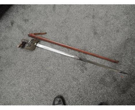 A British Infantry Officers Sword 1895 pattern, George V cypher on 3/4 basket hilt, proof button, engraved blade including Ge