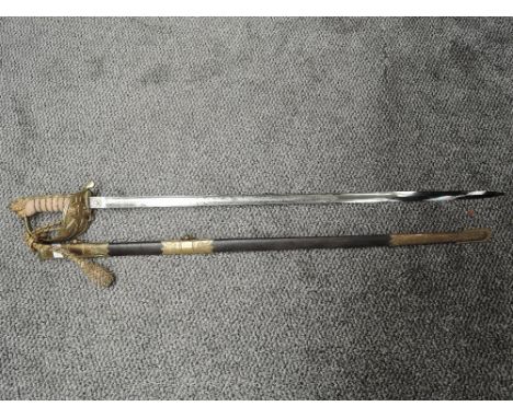 A British Naval Officers Sword with metal scabbard, sword has lion's head pommel and enclosed hilt with anchor &amp; crown, b