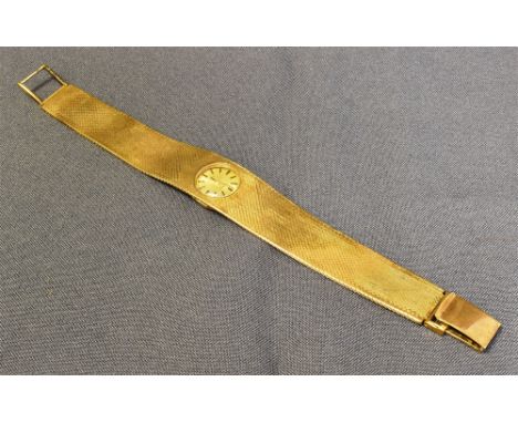 LADIES 9CT GOLD ROTARY COCKTAIL WATCH Oval case with gold coloured dial, hands and batons, signed Rotary 21 Jewels.  Watch mo