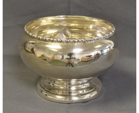 ANTIQUE STERLING SILVER ROSE BOWL Standing 11cm tall, 14cm diameter embossed rim, on shaped foot, hallmarked Birmingham 1925.