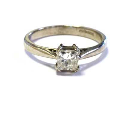 18CT PRINCESS CUT DIAMOND SOLITAIRE claw set in white gold, estimated to total 0.50 carats, with quality assessed in the sett