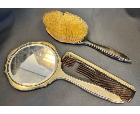 ART DECO SILVER DRESSING TABLE SET including silver mounted natural bristle hair brush, hand mirror and comb. Hallmarked Birm