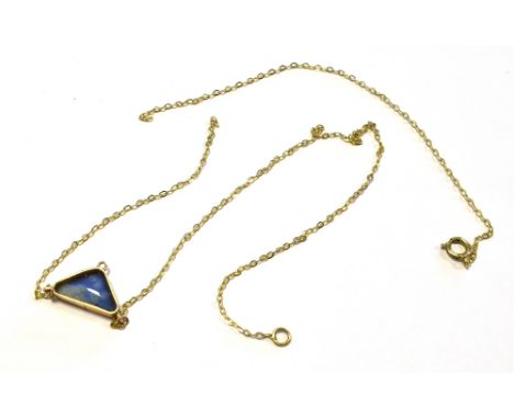 9CT GOLD BLACK OPAL LAVALIER with a bezel set, 13.5mm triangular black opal, showing a good play of red, green and blue colou