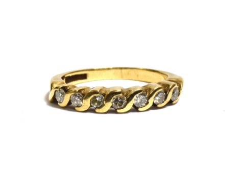 9CT GOLD &amp; DIAMOND ETERNITY RING 3.5mm wide head, with partial bezel set round brilliant cut diamonds, estimated in the s