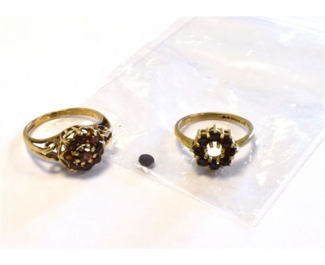 9CT GOLD &amp; PYROPE GARNET RINGS both of floral cluster design, ring sizes K &amp; M, both hallmarked 375.  Weight 4.8 gram