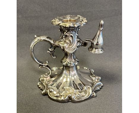 WILLIAM IV SILVER CHAMBERSTICK standing 8.3cm tall, decorated with embossed acanthus leaf and scroll work, complete with remo