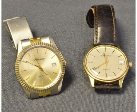 VINTAGE 9CT GOLD GARRARD WATCH 34mm round case, stamped '9K 375 132', champagne dial, signed Garrard, gold coloured hands, sw