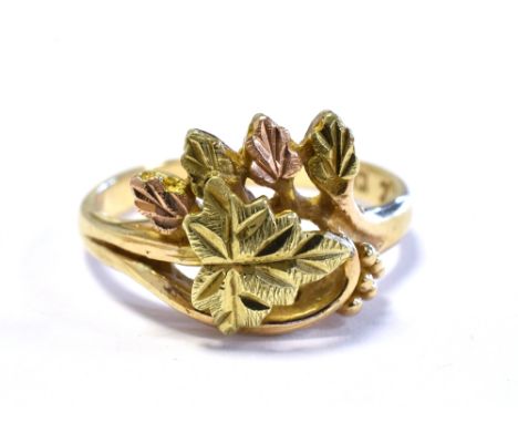 10CT BI-COLOUR GOLD RING decorated with a rose and yellow gold foliate motif head, ring size N. Stamped 10K.  Weight 3.2 gram