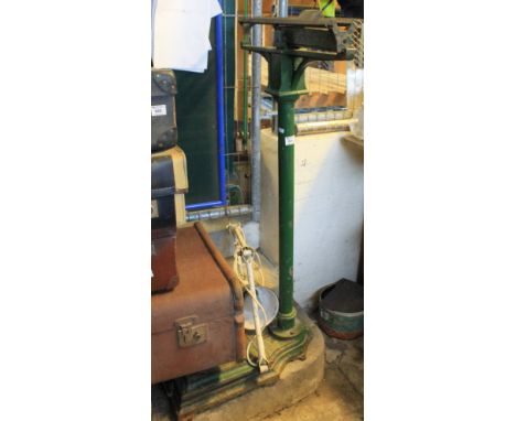 Vintage enamelled metal adjustable work lamp, together with a set of platform scales. (2)(B.P. 24% incl. VAT)