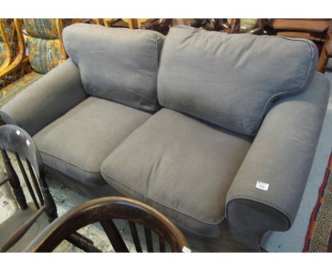 Modern two seater upholstered sofa in plain fabric.(B.P. 24% incl. VAT)