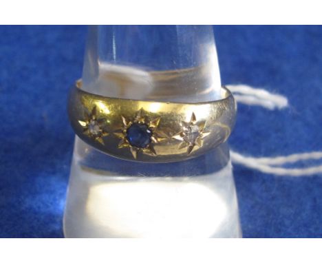 18ct gold, diamond and sapphire gypsy set ring.(B.P. 24% incl. VAT)