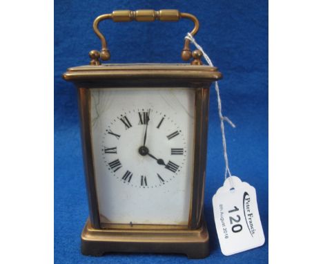 Small brass carriage clock with full depth Roman face, includes key, 12.5cm high.(B.P. 24% incl. VAT)   CONDITION REPORT:  Th