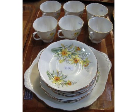 Royal Albert bone china 'Daffodil' design half tea set comprising: six cups, six saucers, six side plates and a sandwich plat