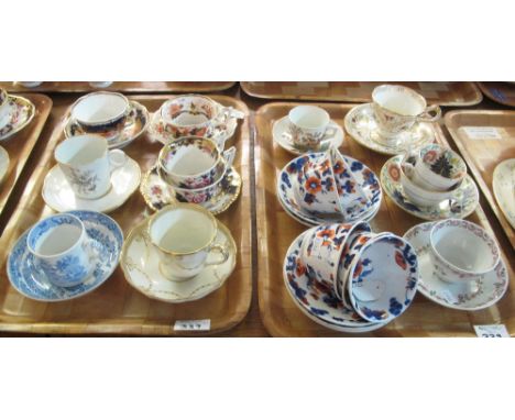 Large collection of assorted cabinet cups and saucers, transfer printed and hand painted, of many varying designs. (4)(B.P. 2