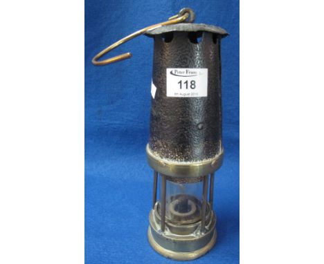 Brass miner's safety lamp stamped: 'Davis, Kirkby', in used condition.(B.P. 24% incl. VAT)