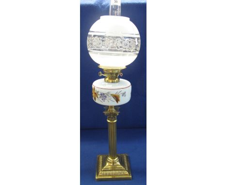 Early 20th Century brass double burner oil lamp with painted glass reservoir on brass Corinthian column pedestal and square f