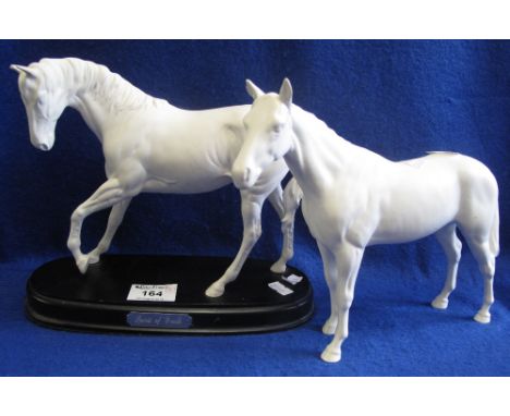 Royal Doulton china horse, 'Spirit of Youth', on wooden base, together with another Beswick china standing white horse. (2)(B