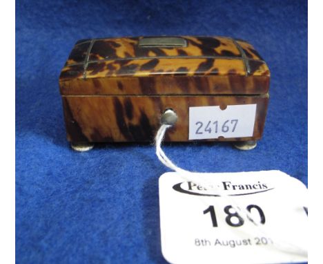 19th Century tortoiseshell snuff box with domed, hinged cover on four ivory feet.(B.P. 24% incl. VAT)