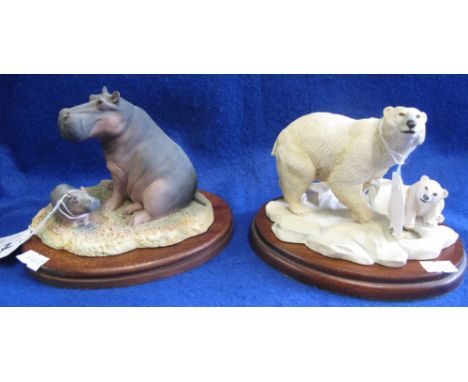 Two Border Fine Arts ceramic groups, 'Endangered Species', 'Hippo and Baby', RW22 and 'Polar Bear and Cub', RW18, both on woo