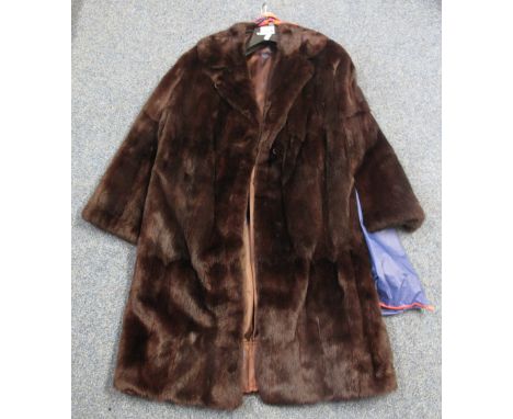 Vintage dark brown three-quarter length fur coat.(B.P. 24% incl. VAT)