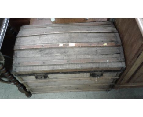 A wooden bound dome toipped trunk 