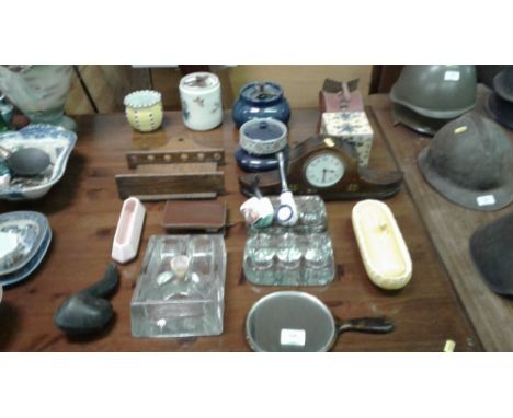 An inlaid mantel clock; an oak pipe rack; tobacco jar etc. 