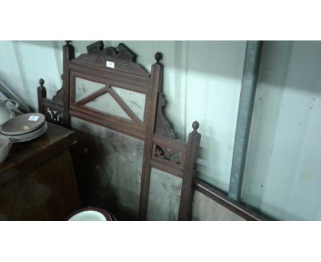 A late Victorian over mantel mirror together with a black and white photographic print 