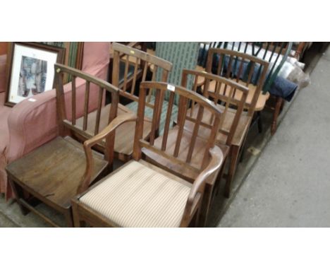 Four various stick back chairs; and a carver chair 